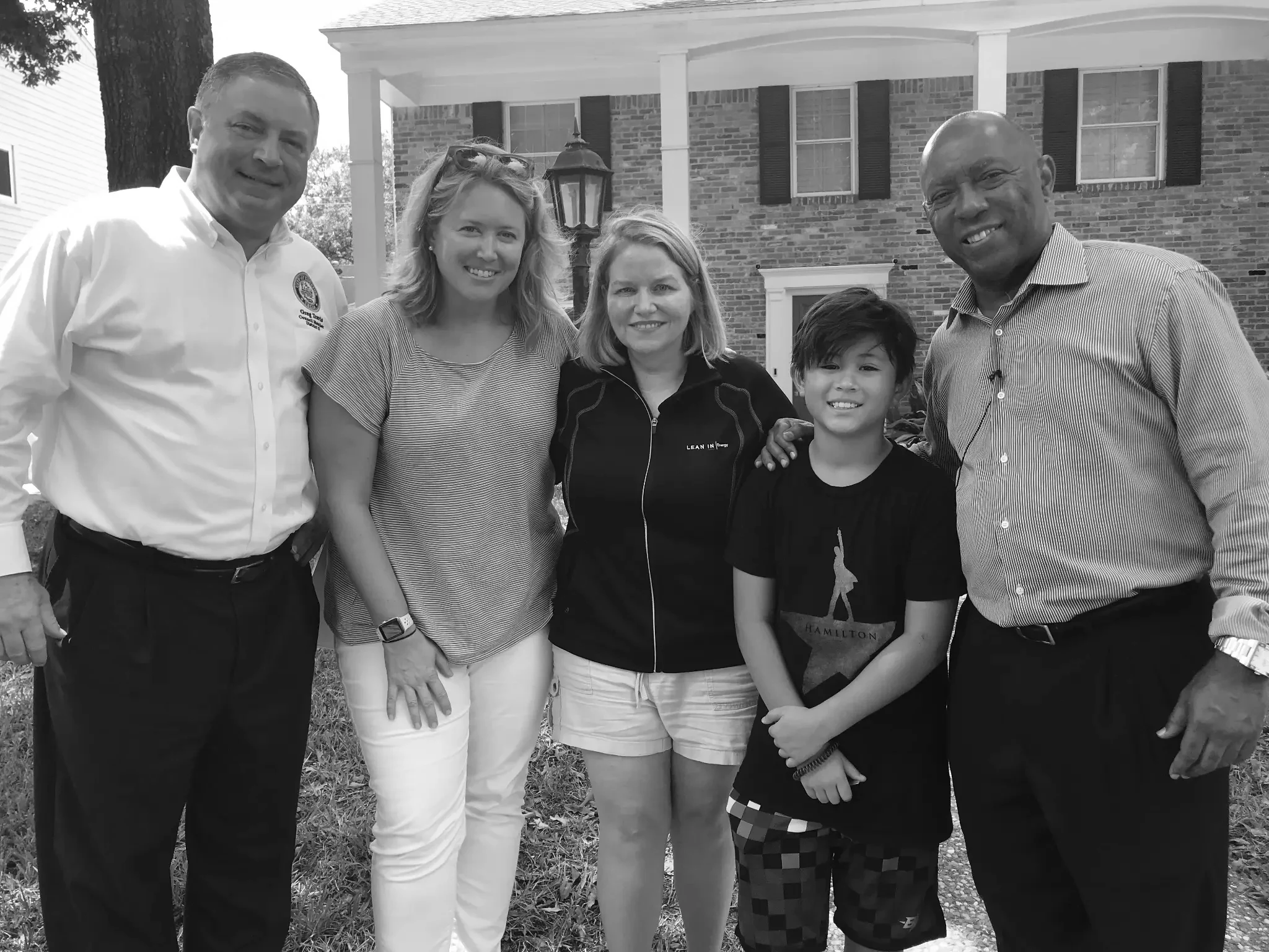 August 2018 — Mayor Turner meets Katie Mehnert on her lawn, one year after Harvey